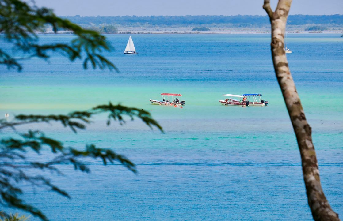 Top Reasons To Visit The Lagoon Of Seven Colors In Bacalar Cancun Sun