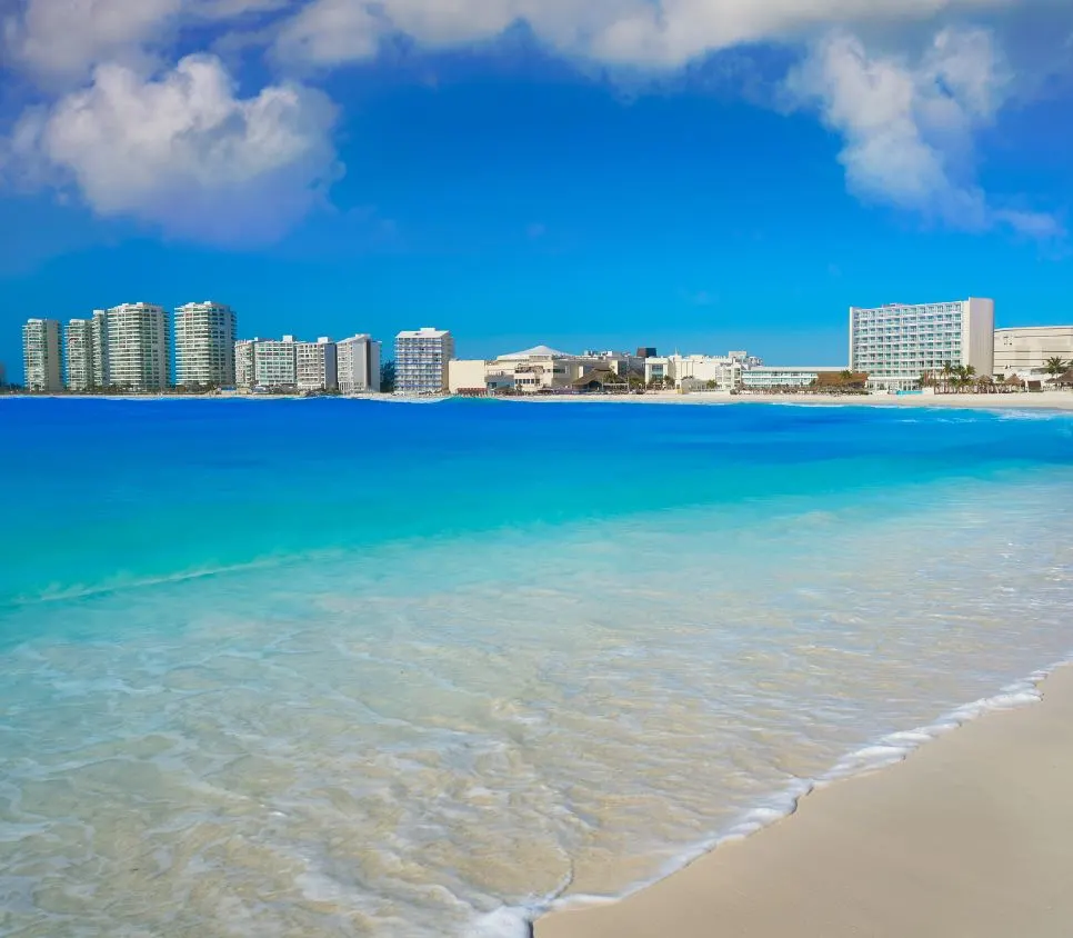 aqua blue water on beach in Cancun