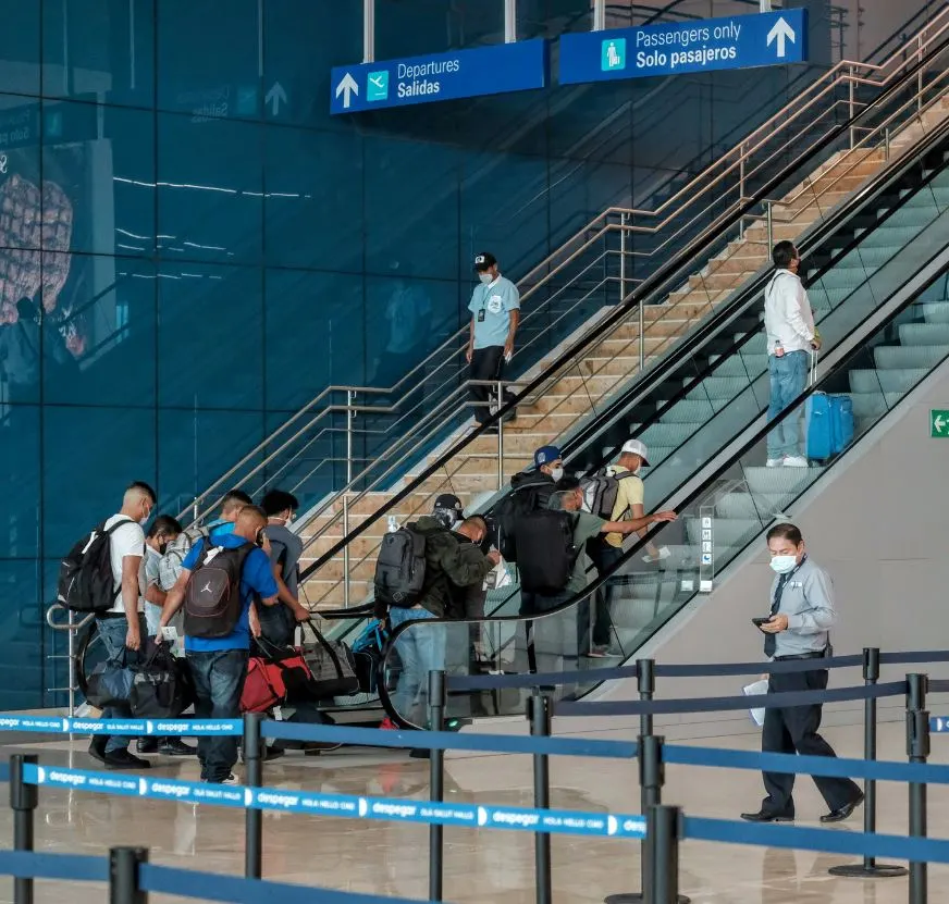 travelers departing at Cancun airport