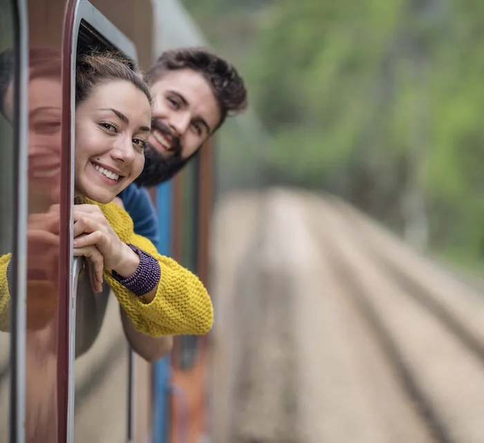 happy couple on train