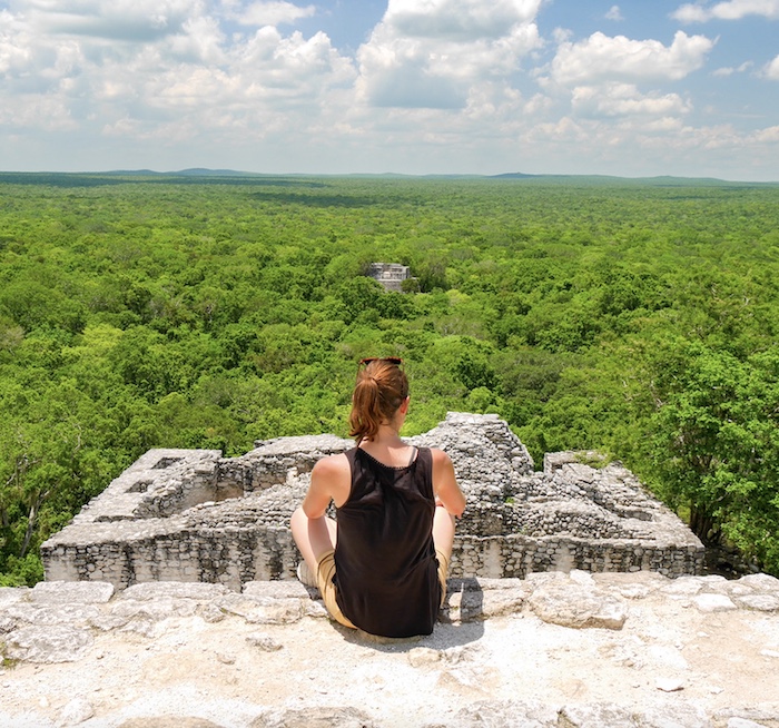 tourist at Calakmul Mayan ruins site
