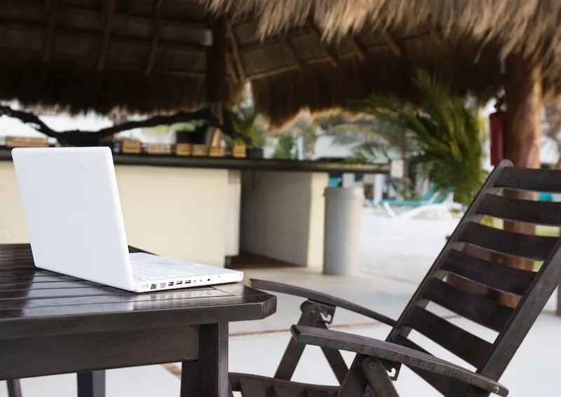 Cabana at Tropical Resort with Laptop