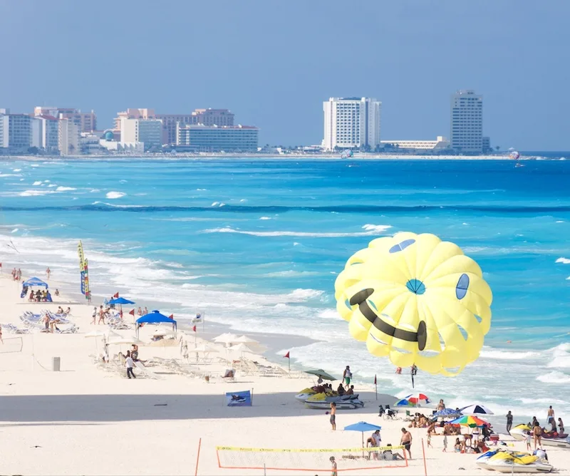 Cancun beach tourists