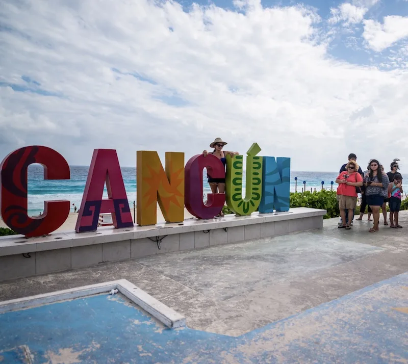 Cancun sign landmark tourists