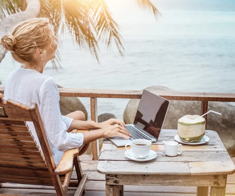 digital nomad laptop beach view