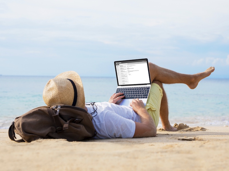 digital nomad laptop beach