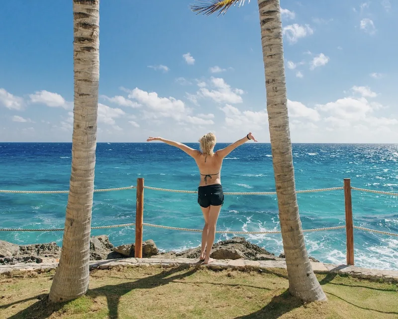 happy tourist Cancun beach