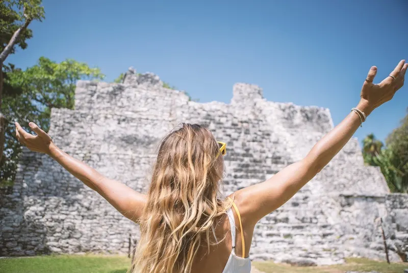 tourist at Maya ruins site