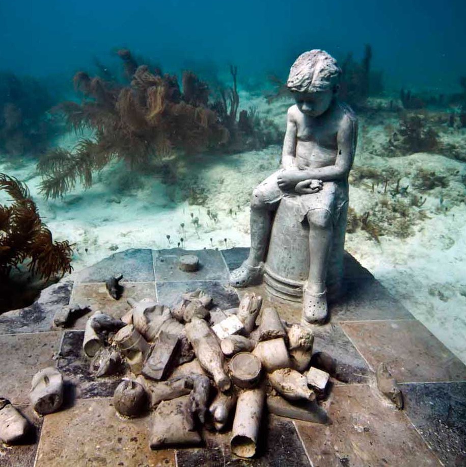MUSA sculptures with reef life in Isla Mujeres