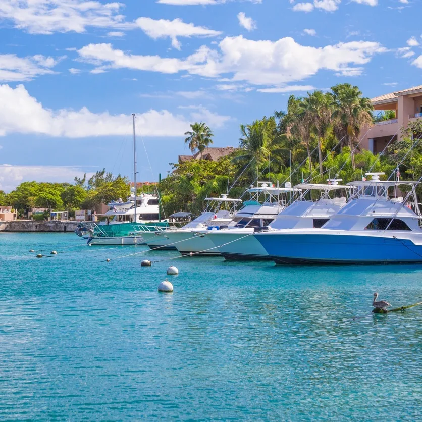 smaller boats docked in Cancun