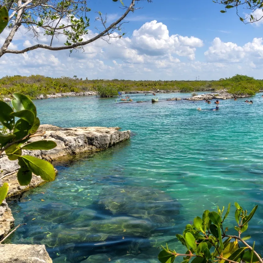 yal ku lagoon in Akumal with swimmers