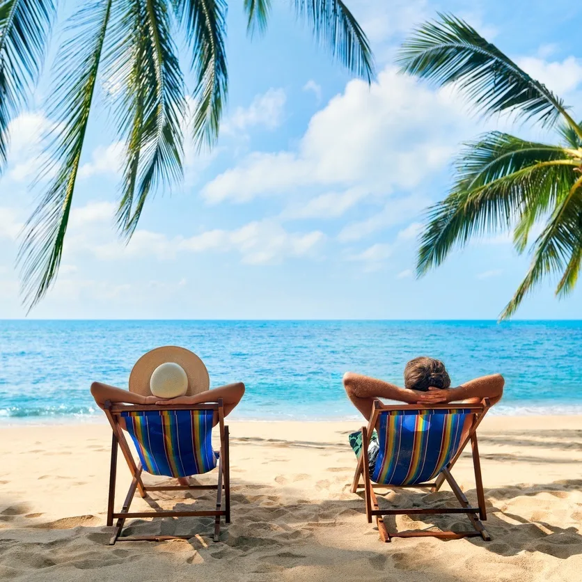 a couple relaxing on a cancun beach