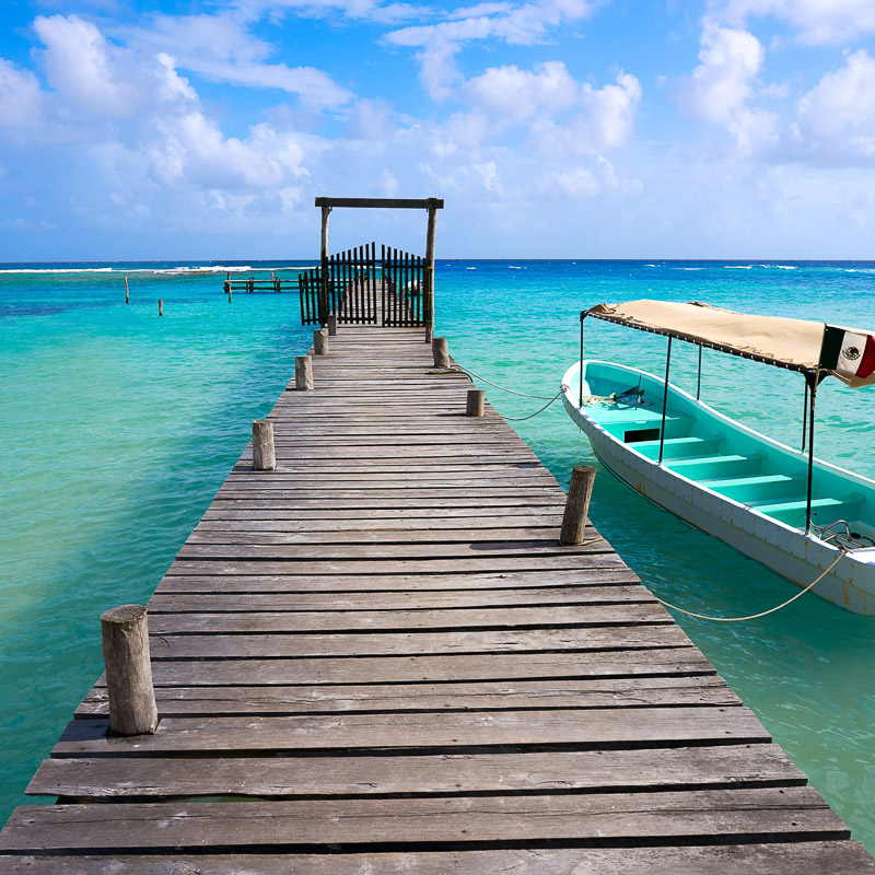 Mahahual Caribbean beach pier in Costa Maya of Mayan Mexico.