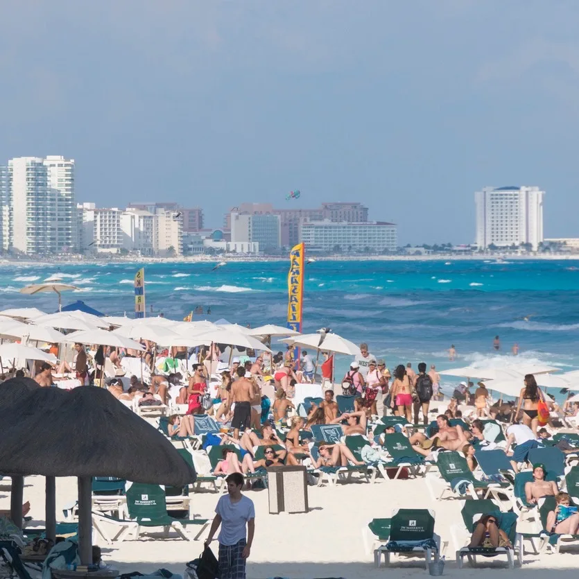 busy Cancun beach area during winter season 