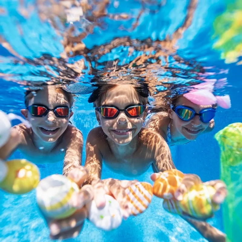 Kids swimming and playing in the water