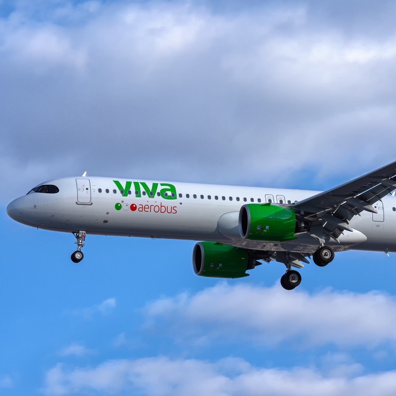 A VivaAerobus airplane on approach to the airport