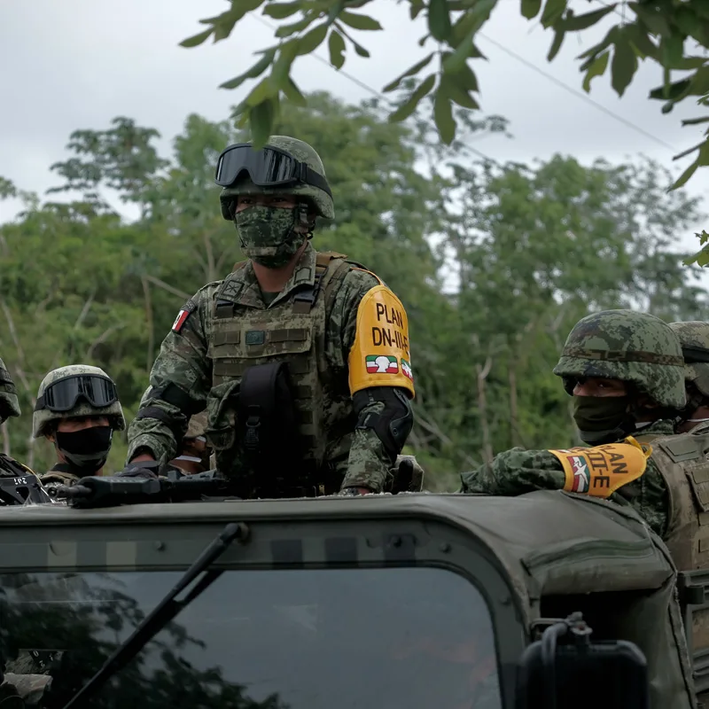 soliders on car