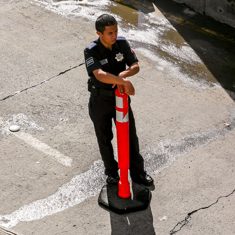 policeman and cone