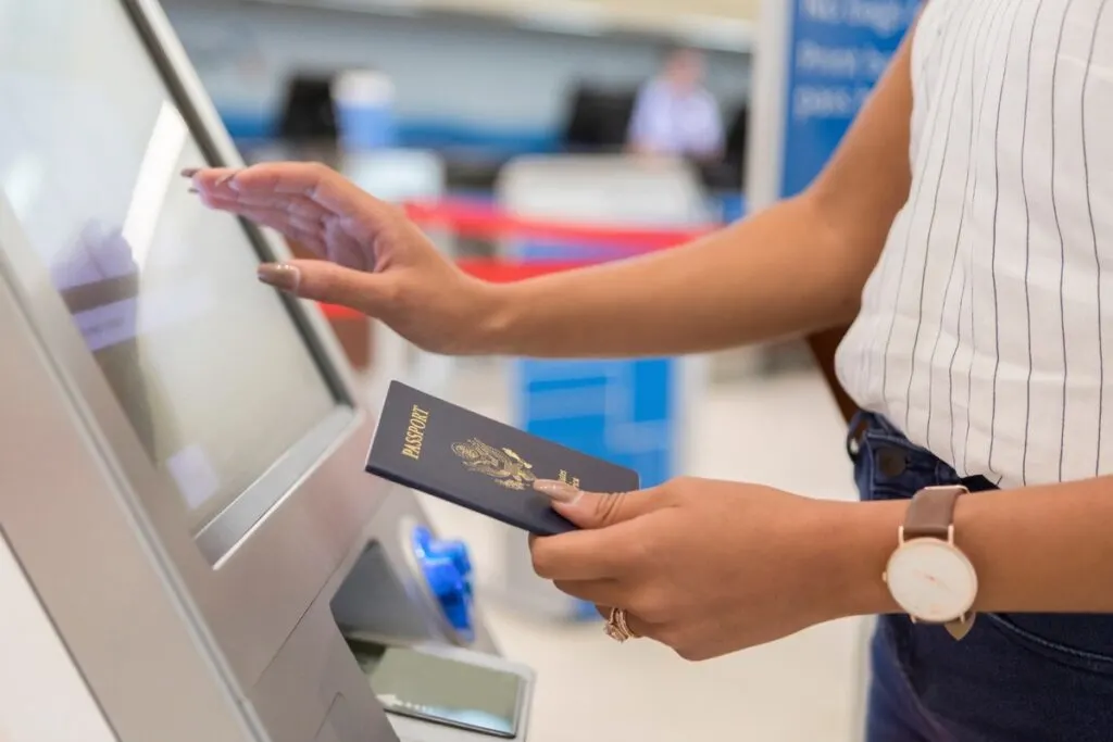 Female traveler checks in at the airport