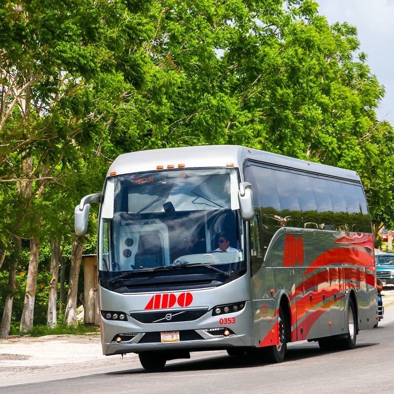 ADO bus in Campeche. Intercity coach bus Volvo 9700 at the interurban road.