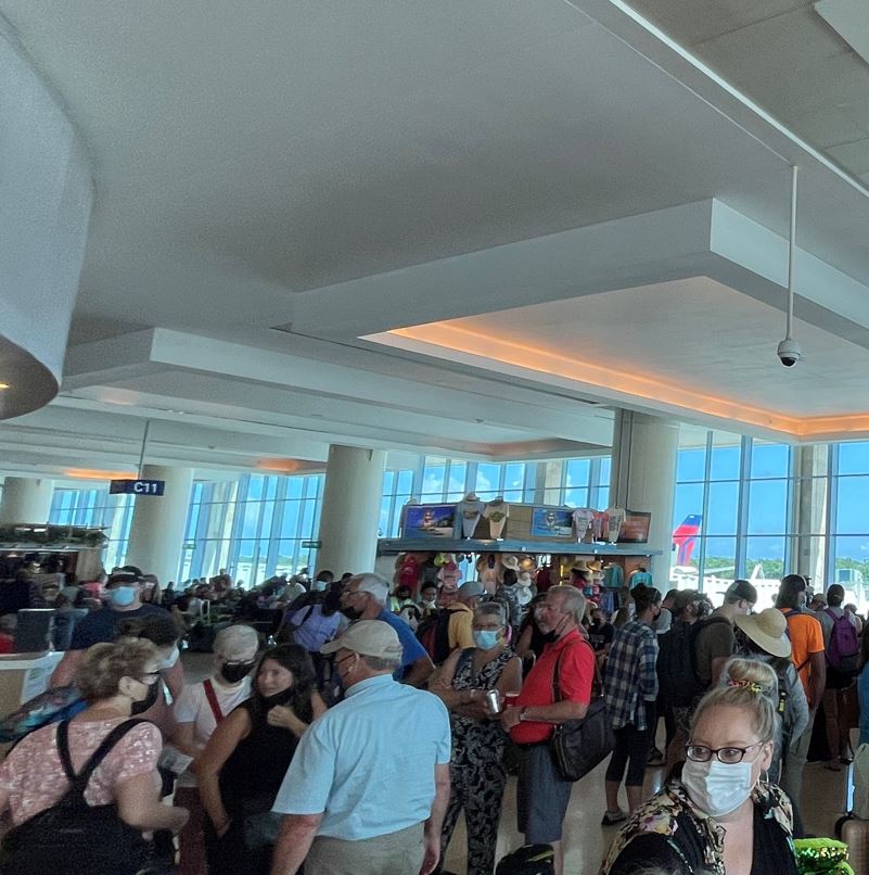 Tourists Waiting At Cancun Airport