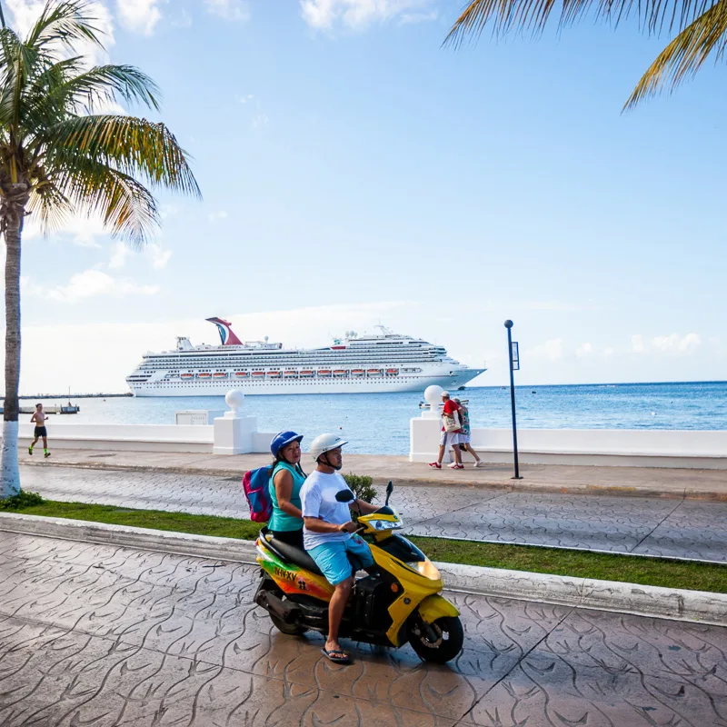 moped and cruise ship