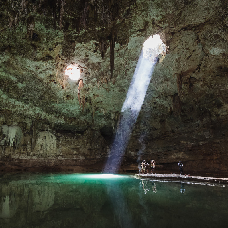 cenote with sunight coming in