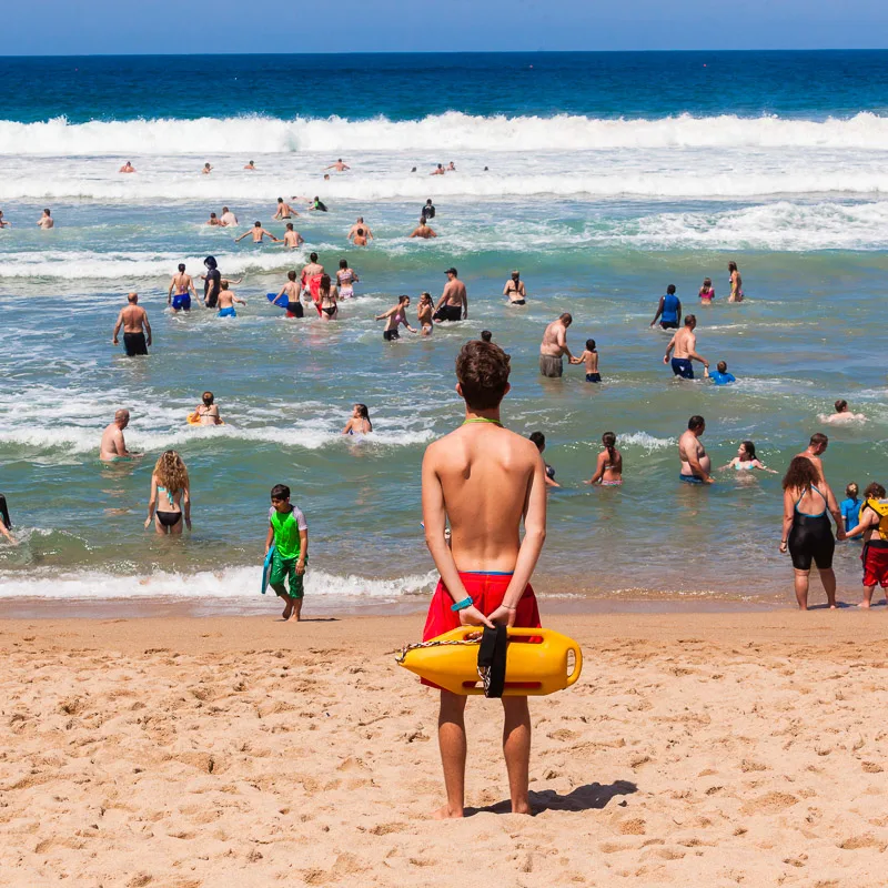 lifeguard watching tourists in Cancun sea
