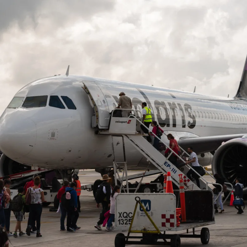 Tourists boarding a Volaris flight