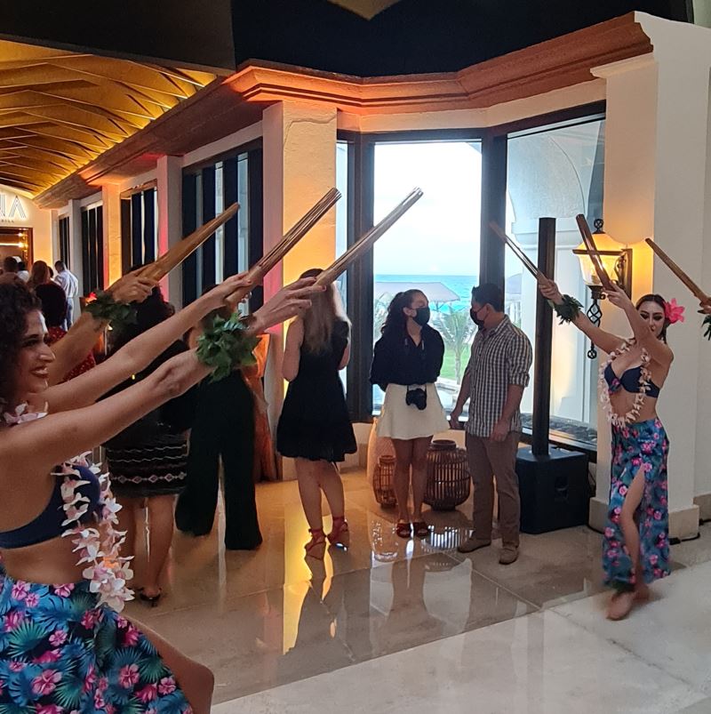 Ladies Welcoming Guests To Hotel