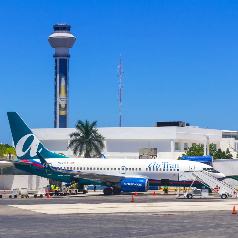 cancun airport with plane