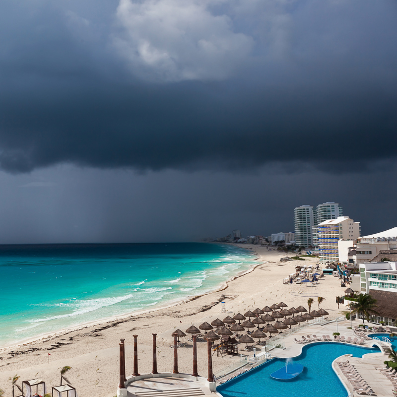 cancun with storm clouds