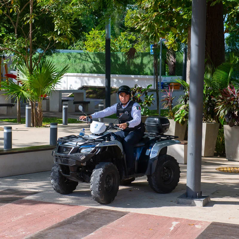 cancun policeman on quad bike