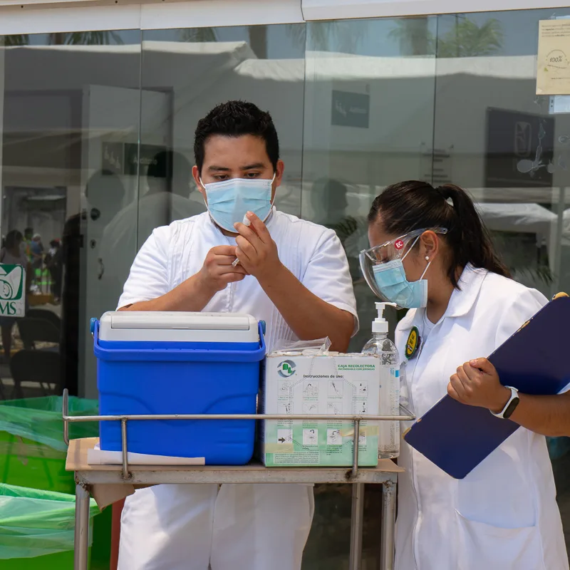 doctor and nurse prepare for vaccination