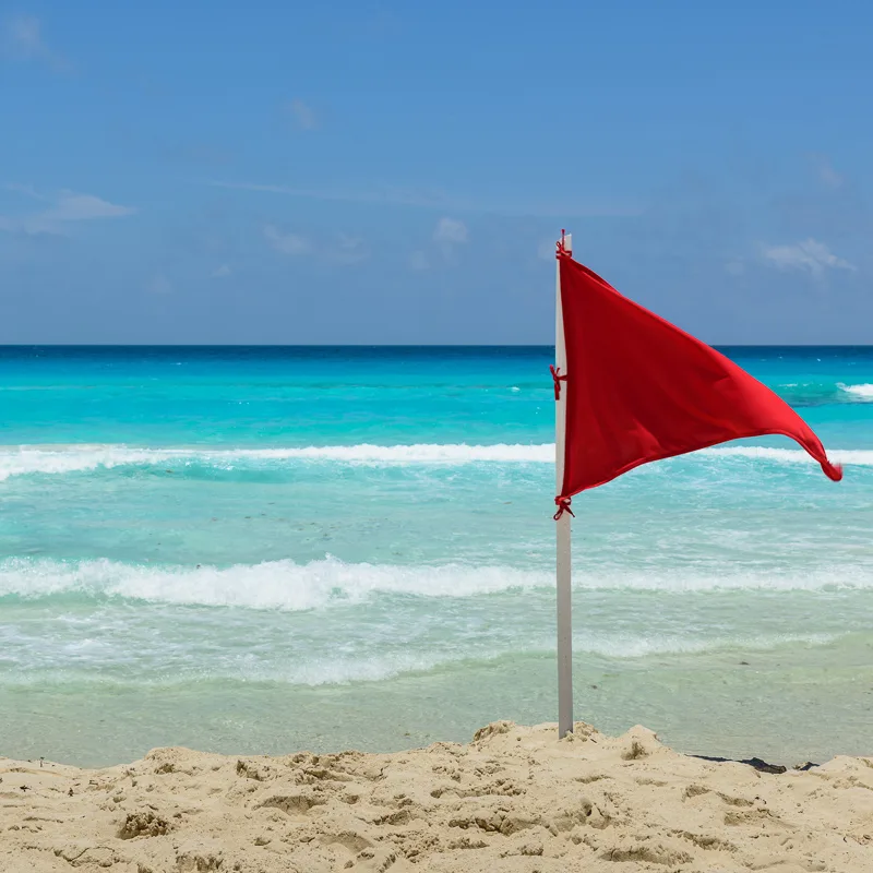 red flag on cancun beach