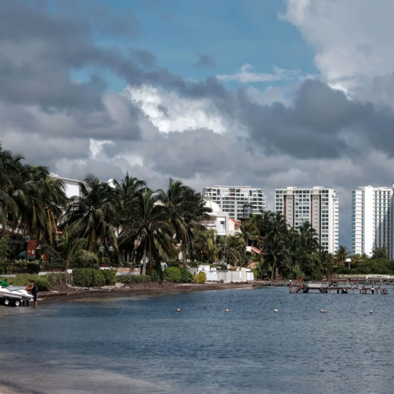 Cancun Clouds and water with hotel buildings 