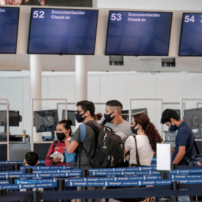 Tourists in airport with masks 