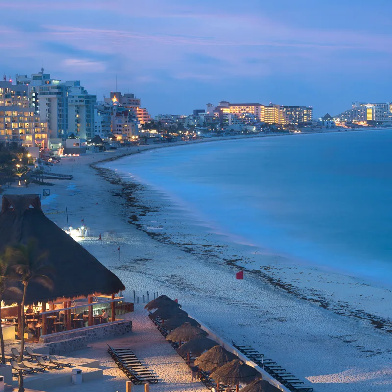 cancun beach at sunset