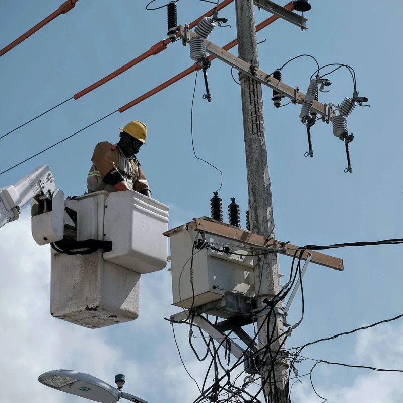 man working on power cable