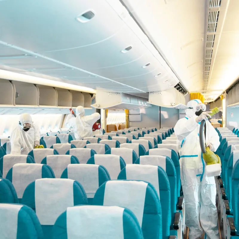 staff cleaning the plane