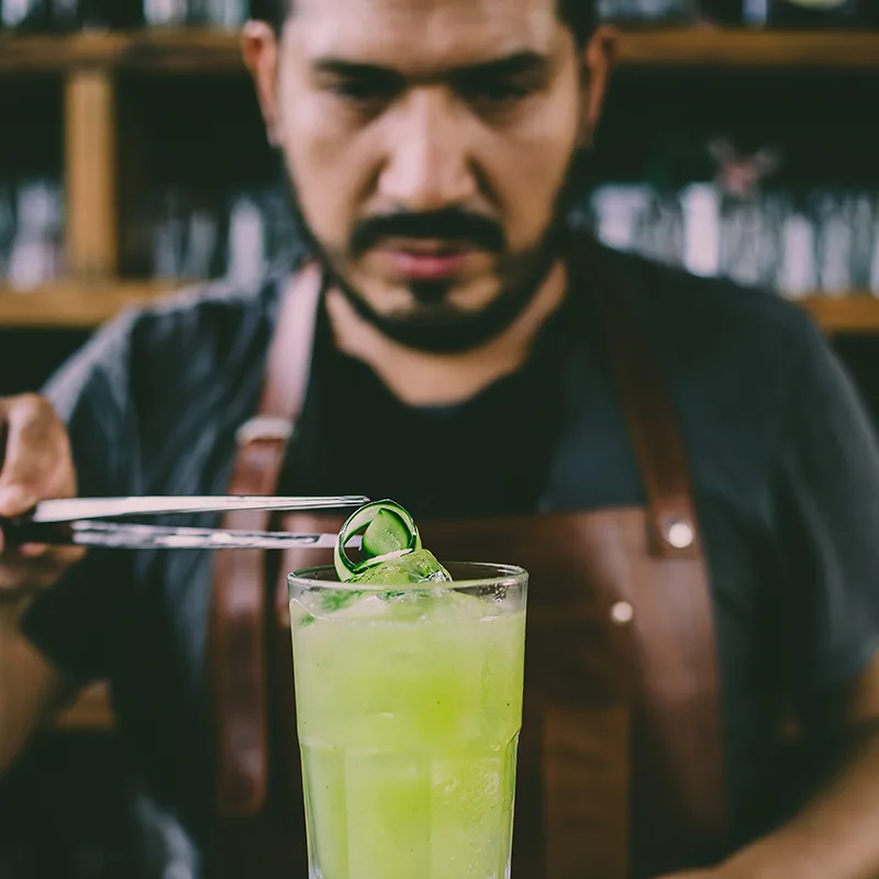 Bartender with cocktail