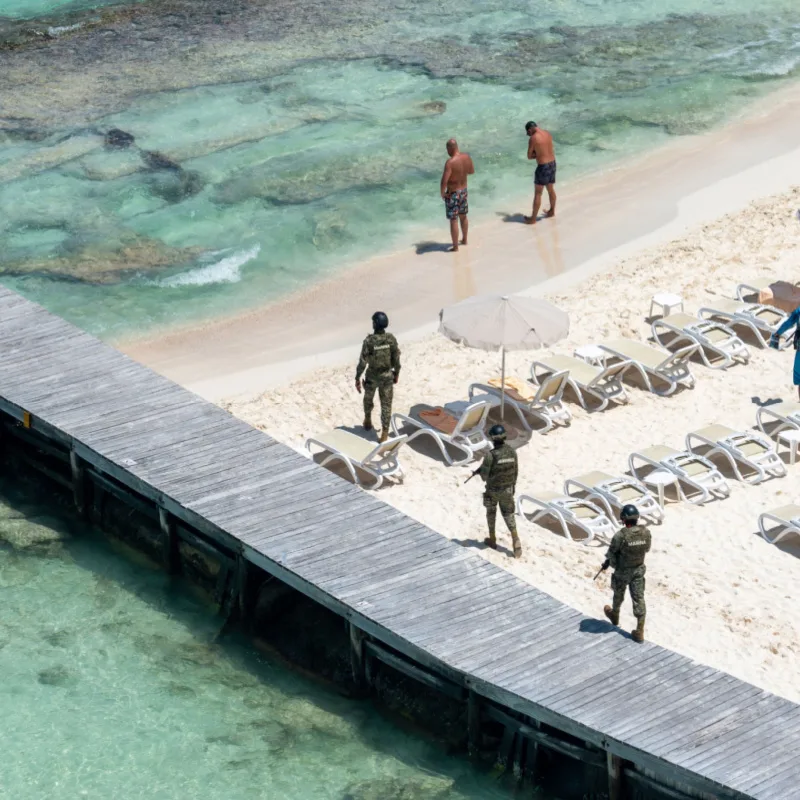 Marines on patrol at a local beach