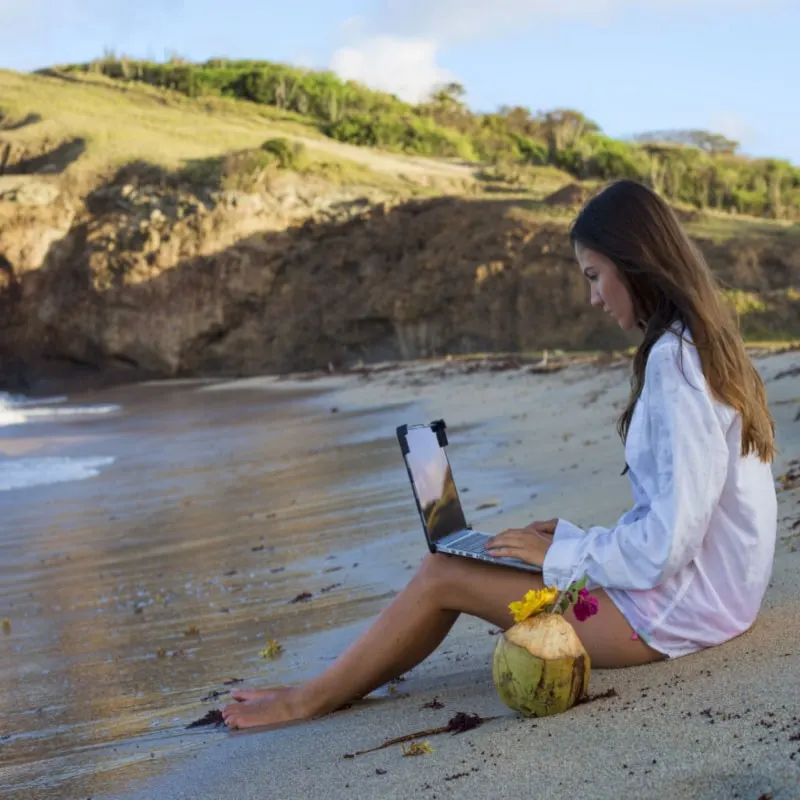 digital nomad at the beach