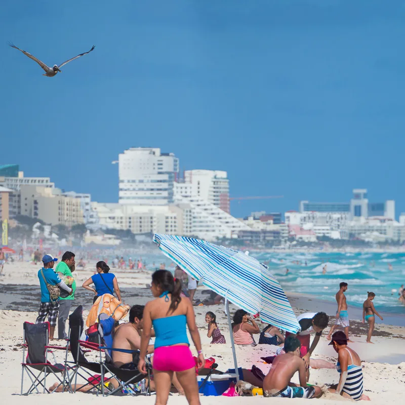 busy beach in cancun