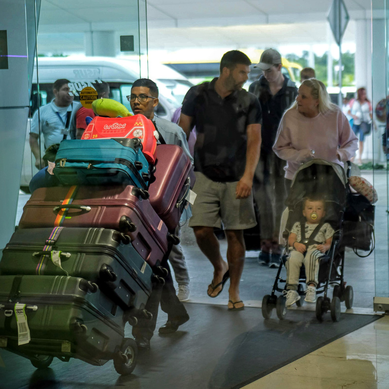family arrives at airport
