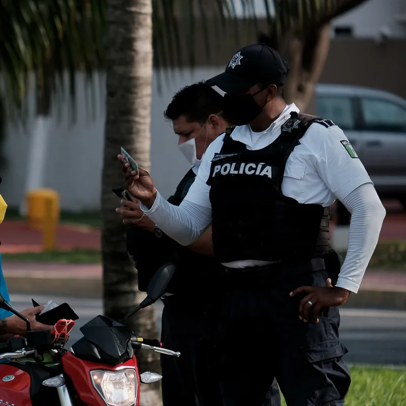 policeman checking id