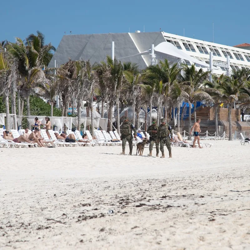 federal police patrolling cancun beach