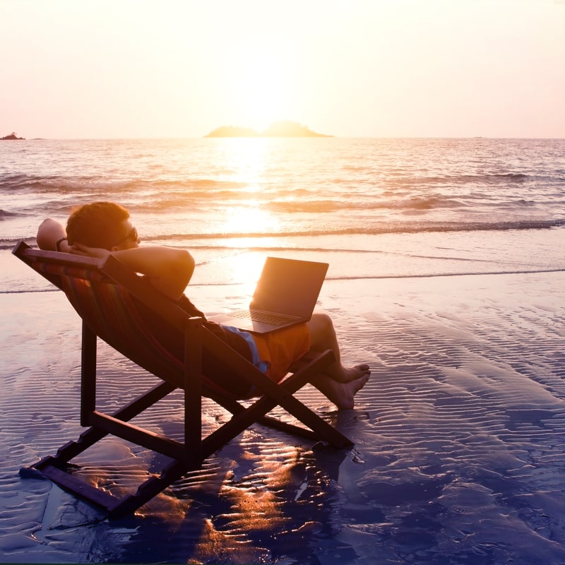 man relaxing at the beach