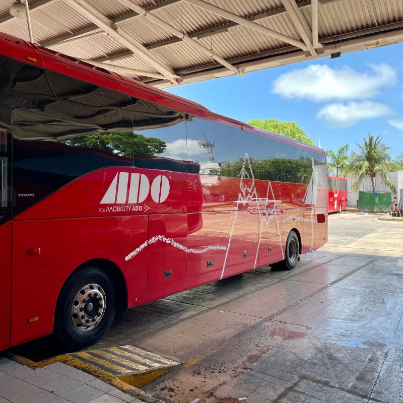 ADO bus ready to transport passengers to belize