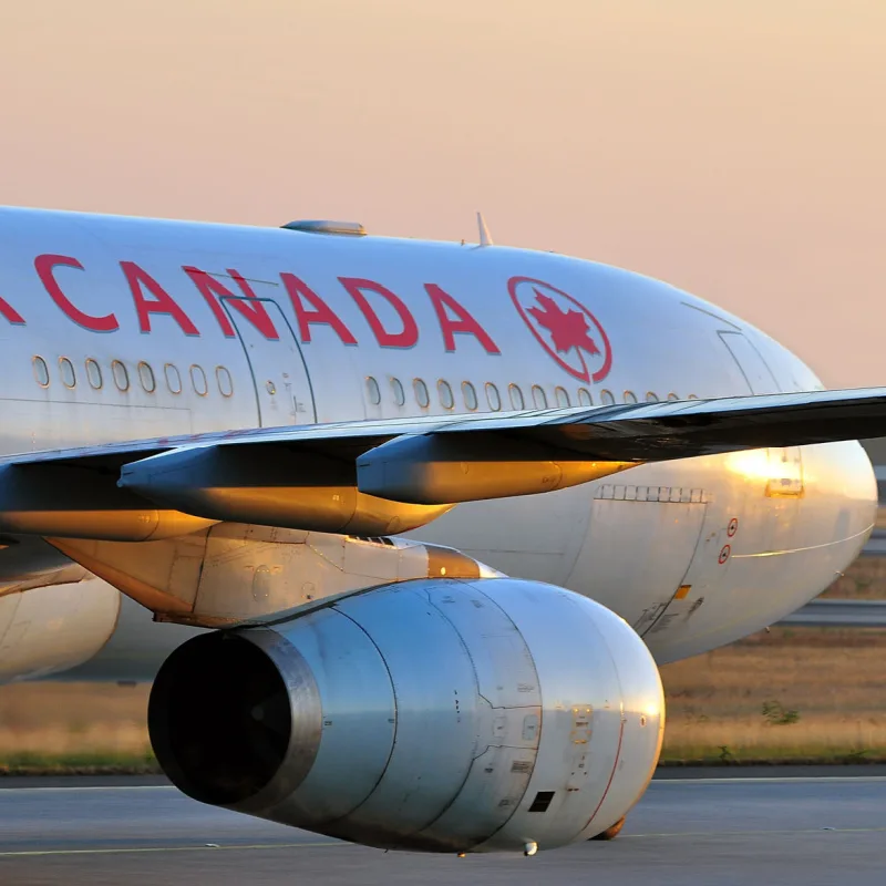 Air Canada aircraft on tarmac taxiing in cancun 